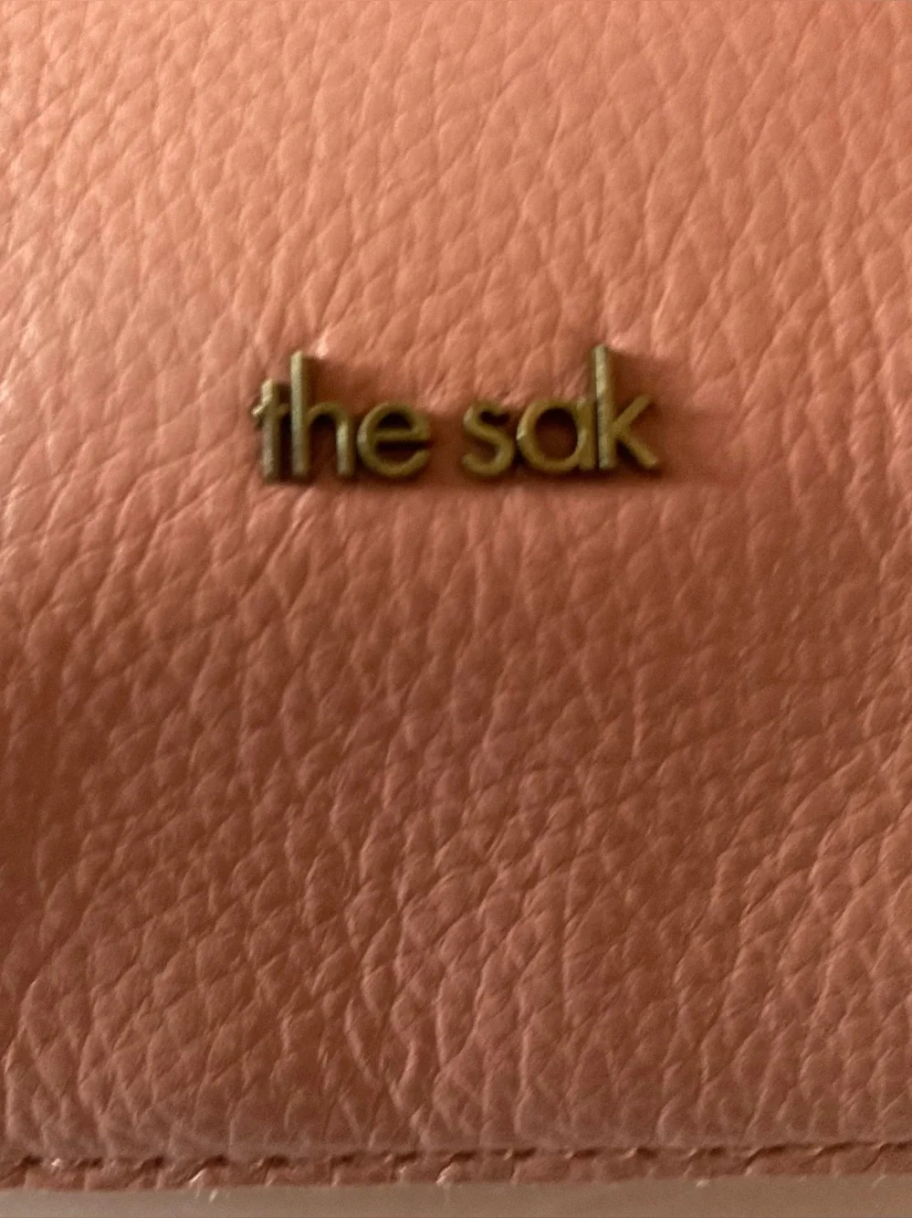 The Sak coral lite pink Leather Cutout-Handle Crossbody Clutch Hand Stitched